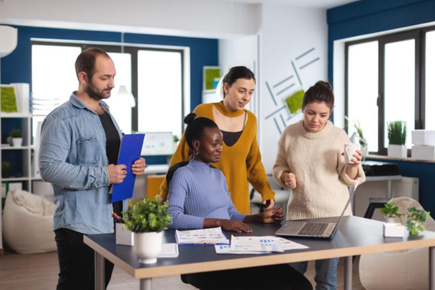 Financial analysis materials spread across workspace